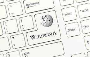 White conceptual keyboard - Wikipedia (key with logotype)